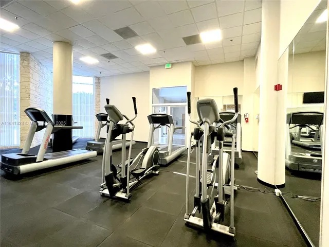 a view of a room with gym equipment