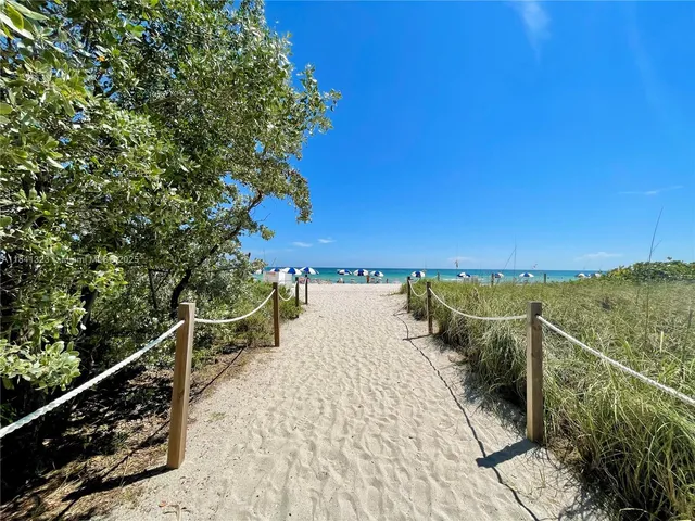 a view of a balcony with chairs