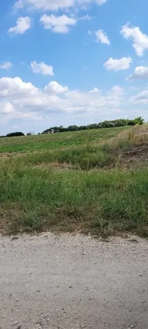 a view of a lake with mountains in the background