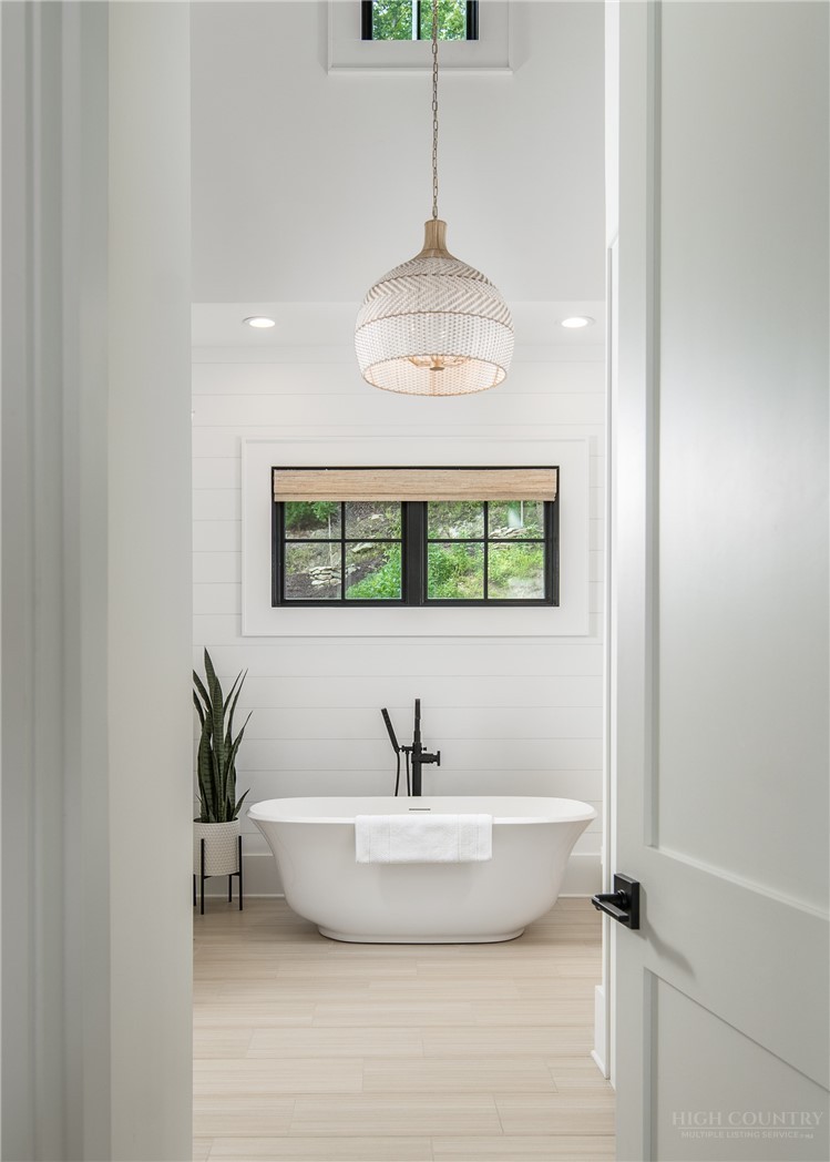 1236 Ninebark Road Boone, NC 28607 - Photo 19 of 50 a bathroom with a sink and a window