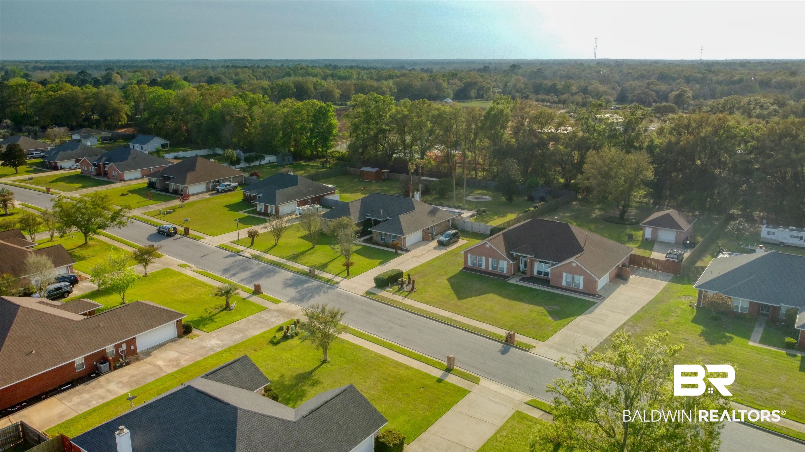 12893 Hunters Chase Foley, AL 36535 - Photo 7 of 42 Aerial view with a forest view and a residential view
