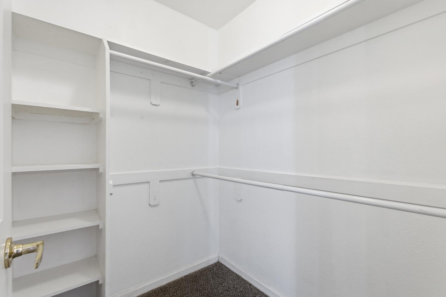 184 South Double Tree Way Madera, CA 93637 - Photo 22 of 37 a view of an empty walk in closet