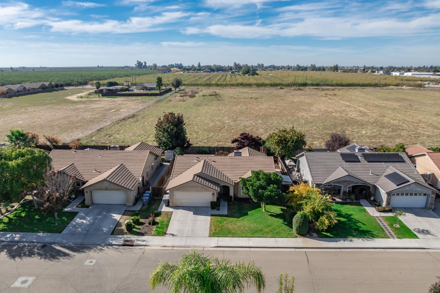 184 South Double Tree Way Madera, CA 93637 - Photo 36 of 37 an aerial view of a house with lake view