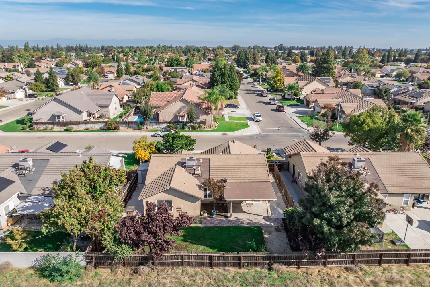 184 South Double Tree Way Madera, CA 93637 - Photo 37 of 37 an aerial view of a house with outdoor space