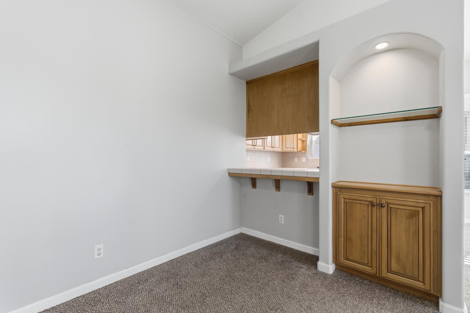 184 South Double Tree Way Madera, CA 93637 - Photo 9 of 37 an empty room with windows