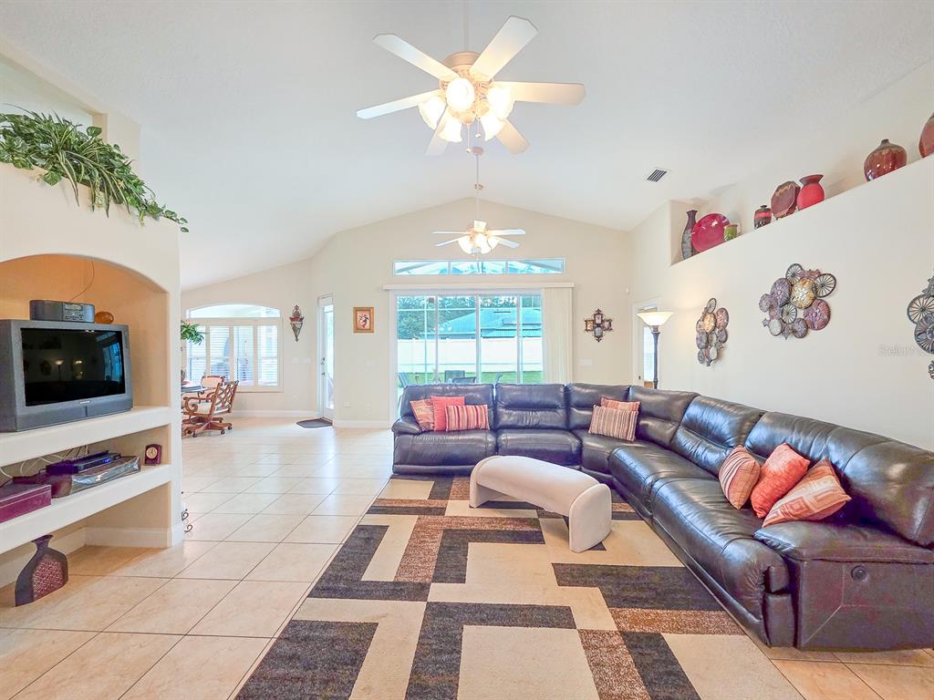 1 Ripley Place Palm Coast, FL 32164 - Photo 13 of 54 a living room with furniture and a flat screen tv