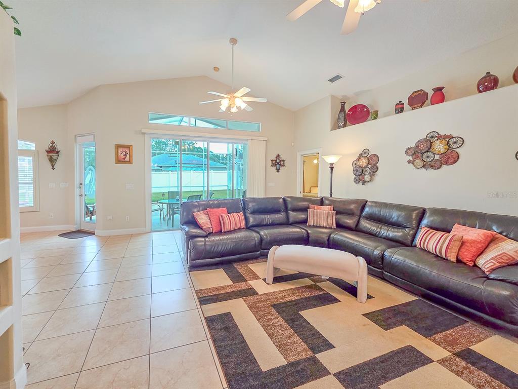 1 Ripley Place Palm Coast, FL 32164 - Photo 15 of 54 a living room with furniture and a window