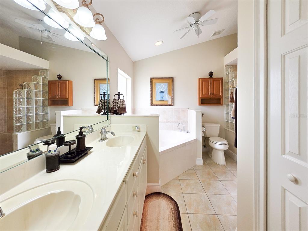 1 Ripley Place Palm Coast, FL 32164 - Photo 28 of 54 a kitchen with a sink appliances and cabinets