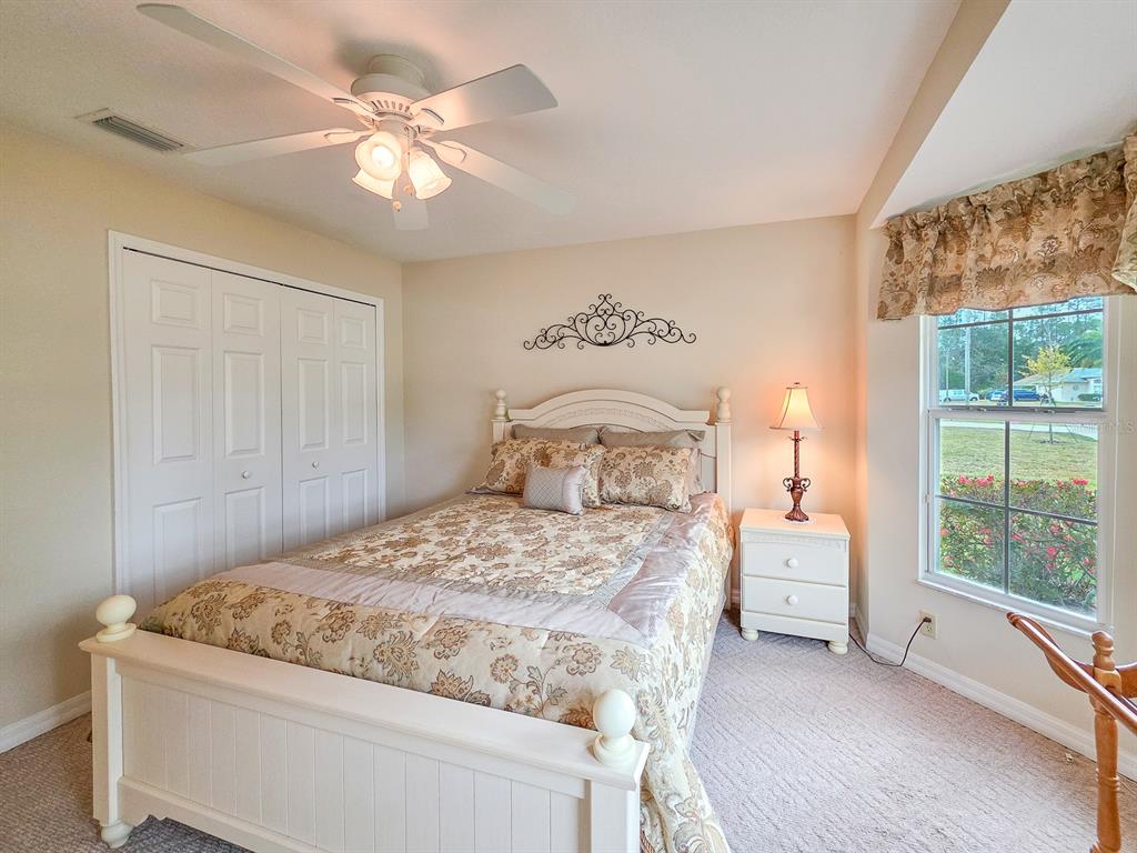 1 Ripley Place Palm Coast, FL 32164 - Photo 34 of 54 a bedroom with a bed and a window