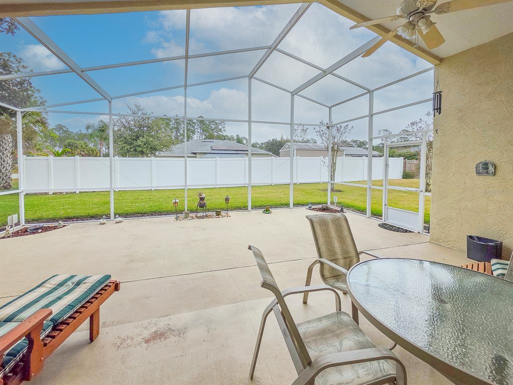 1 Ripley Place Palm Coast, FL 32164 - Photo 41 of 54 a view of a swimming pool with a lounge chairs