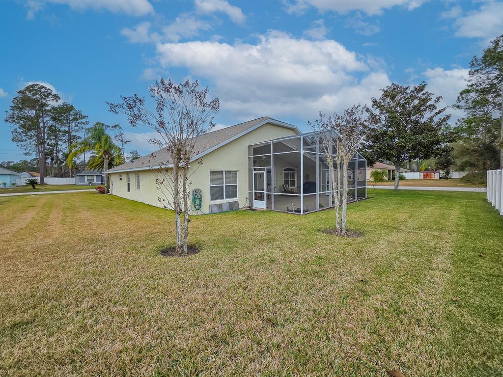 1 Ripley Place Palm Coast, FL 32164 - Photo 46 of 54 a view of a house with backyard and sitting area