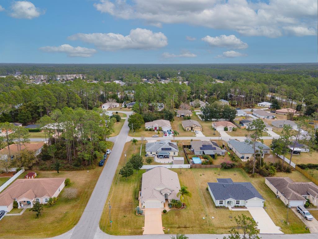 1 Ripley Place Palm Coast, FL 32164 - Photo 48 of 54 an aerial view of residential houses with outdoor space