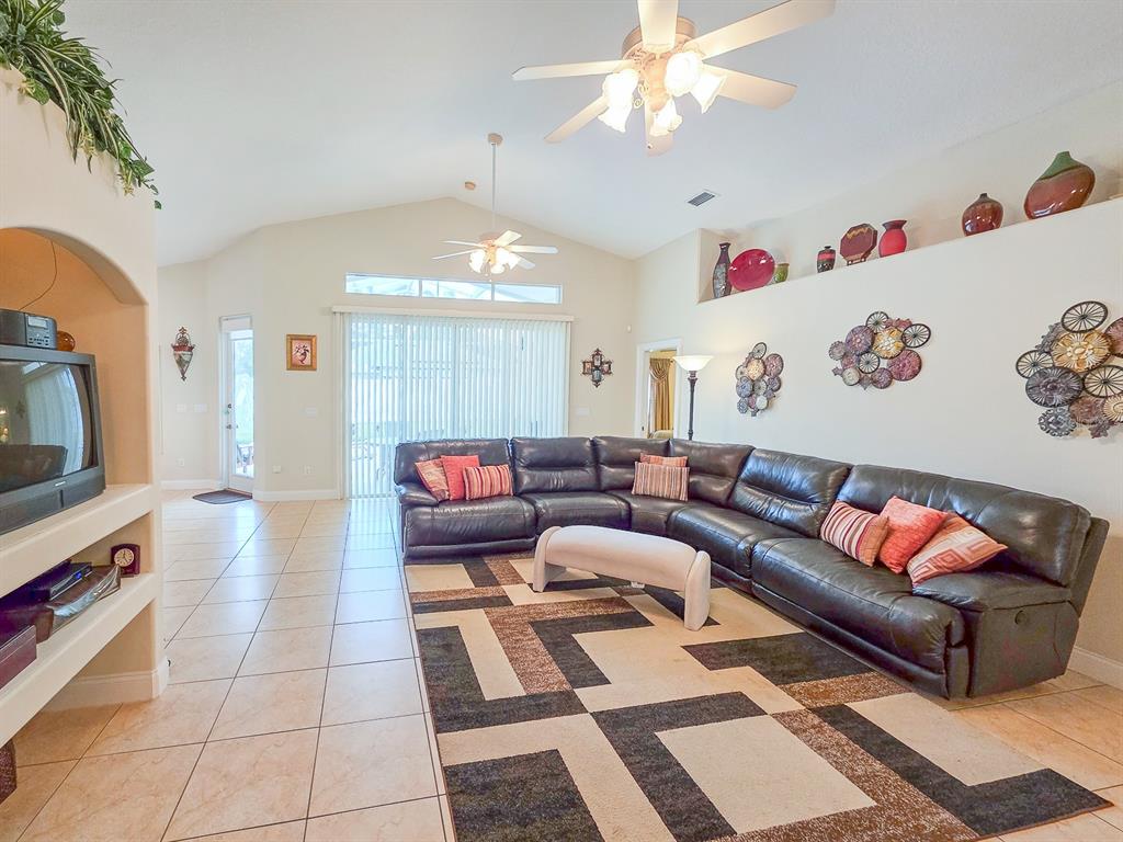 1 Ripley Place Palm Coast, FL 32164 - Photo 5 of 54 a living room with furniture and a chandelier