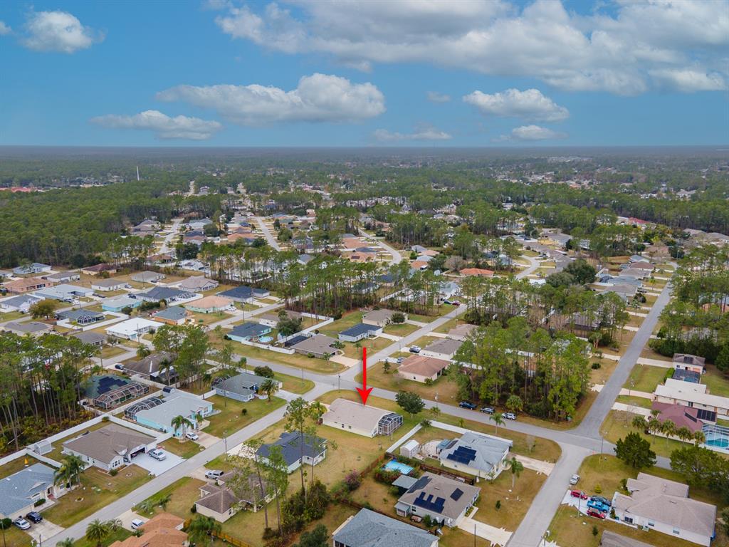 1 Ripley Place Palm Coast, FL 32164 - Photo 51 of 54 an aerial view of residential building with green space
