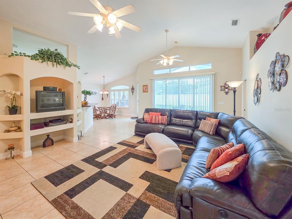 1 Ripley Place Palm Coast, FL 32164 - Photo 6 of 54 a living room with furniture and a flat screen tv