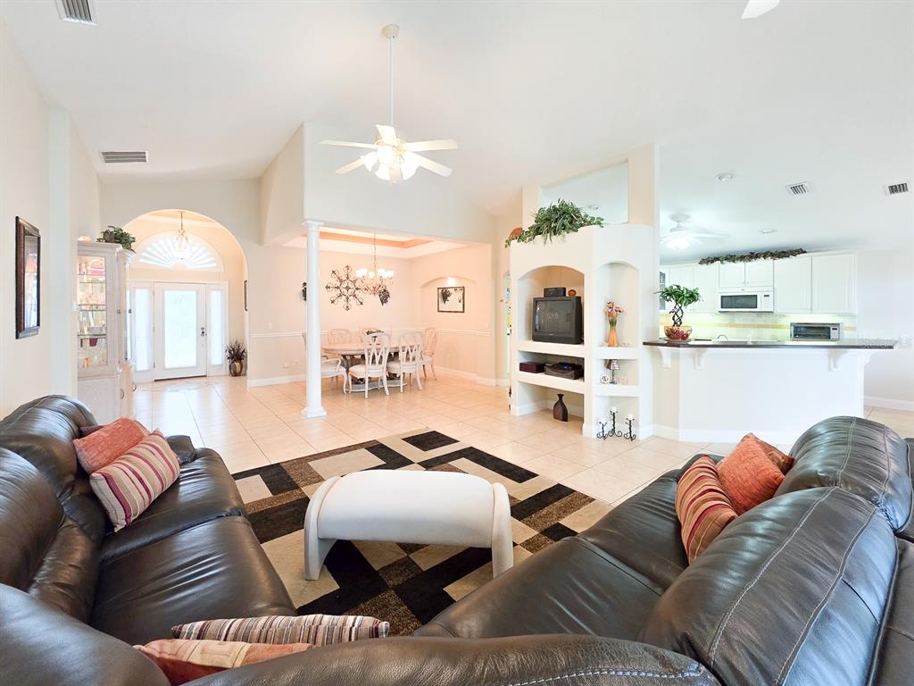 1 Ripley Place Palm Coast, FL 32164 - Photo 8 of 54 a living room with furniture fireplace and wooden floor