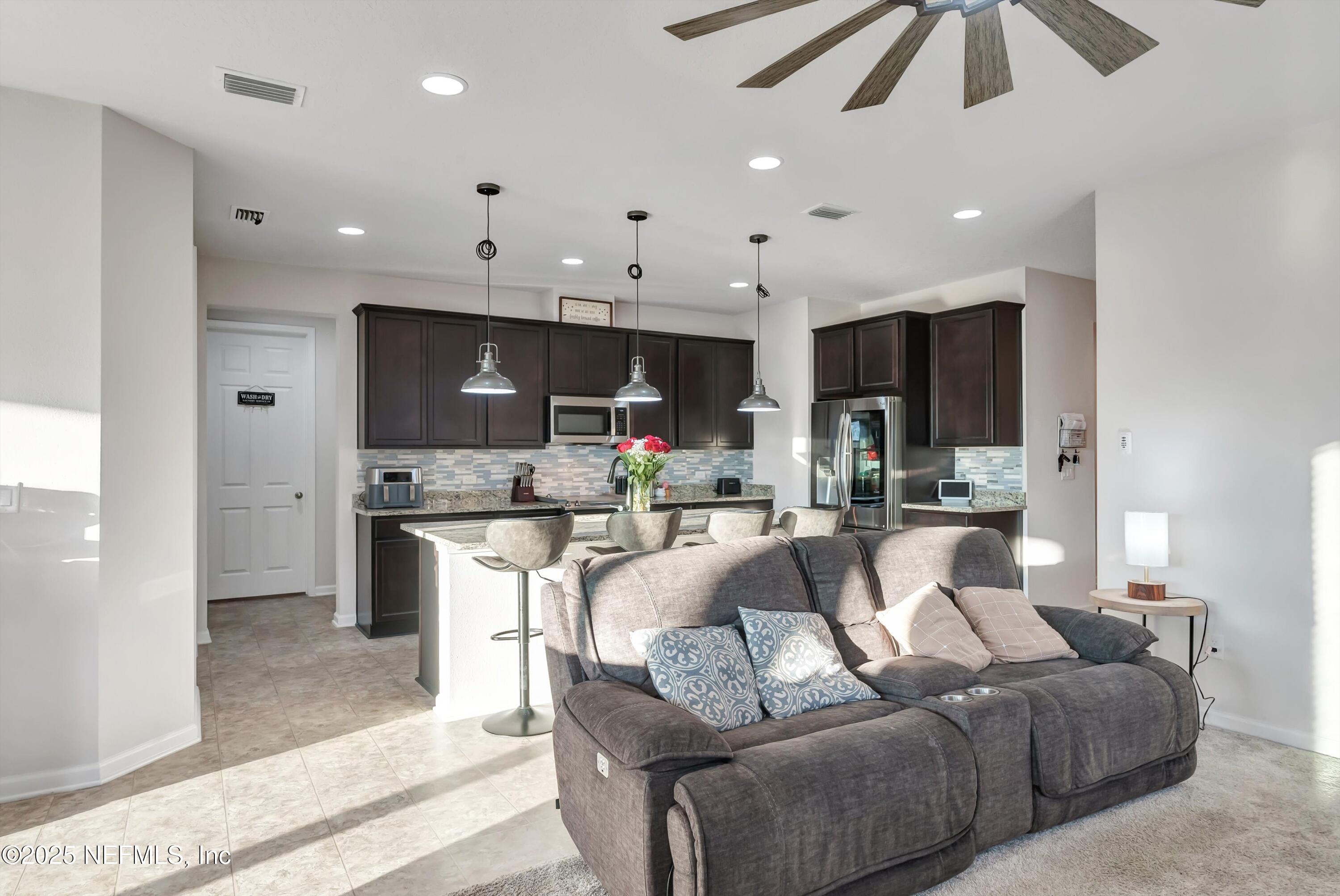 6320 Thatcher Jacksonville, FL 32222 - Photo 9 of 31 Living to Kitchen