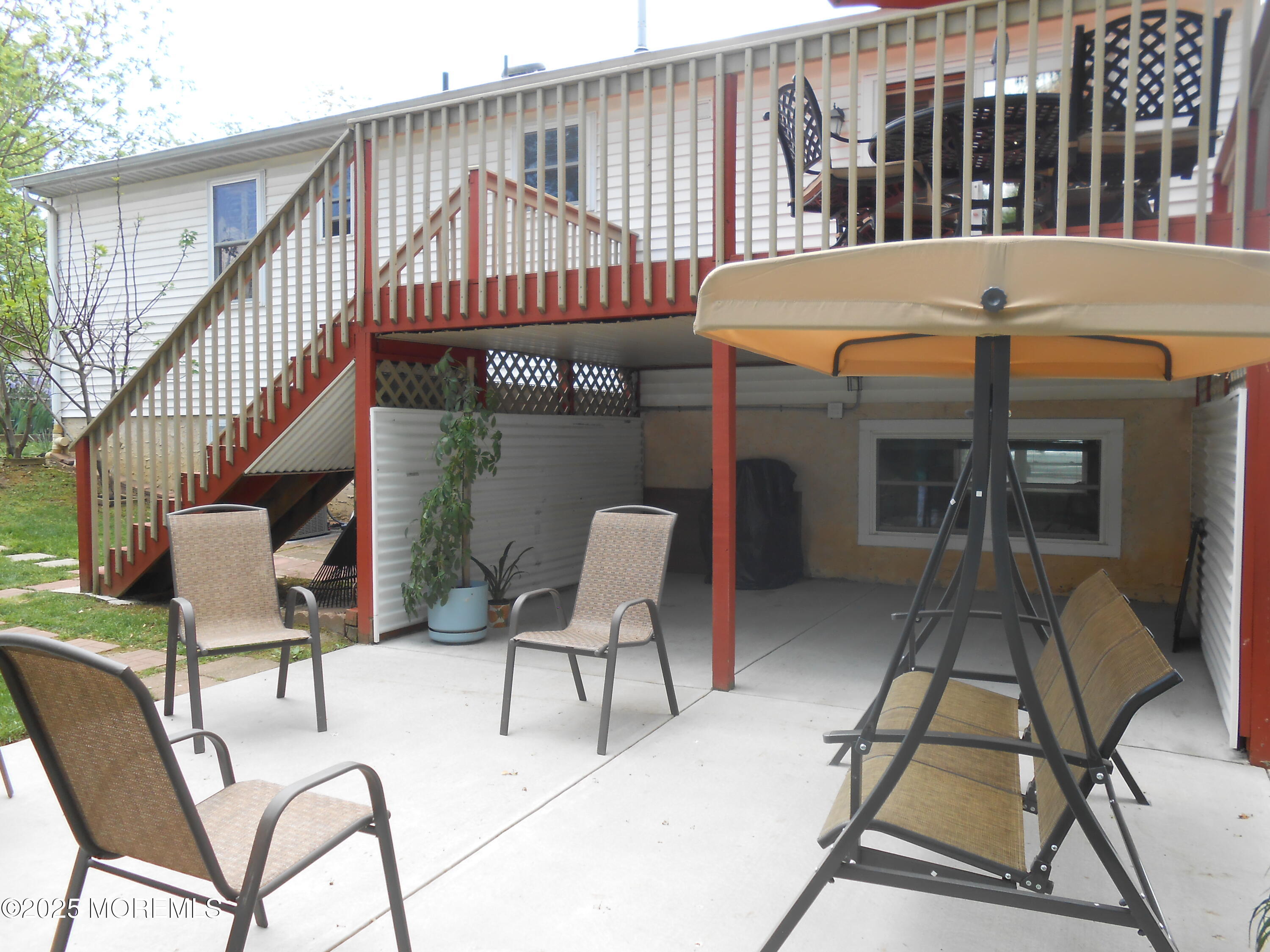 603 Bloomfield Drive Westampton, NJ 08060 - Photo 18 of 66 a view of a chairs and tables in the patio