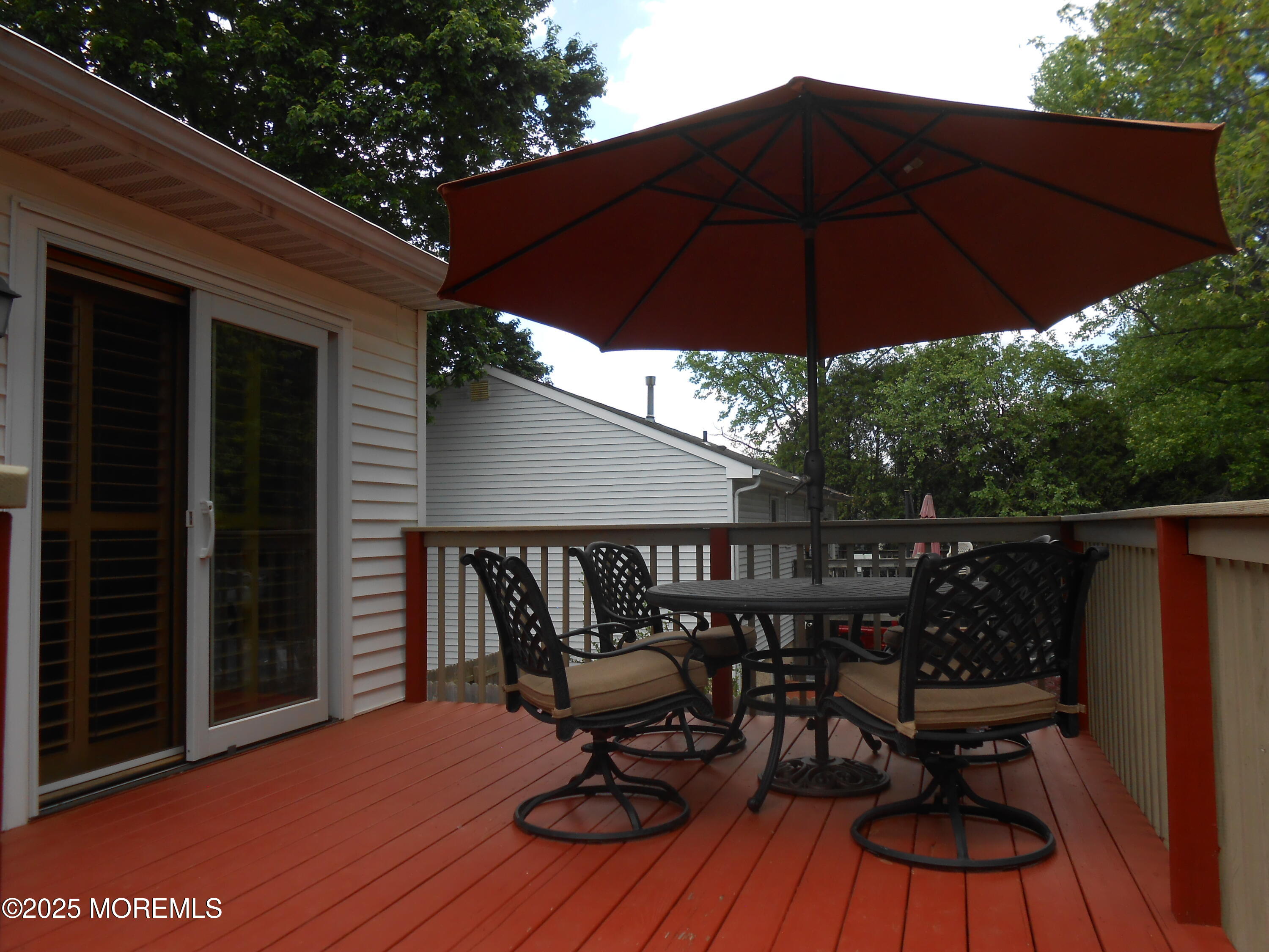 603 Bloomfield Drive Westampton, NJ 08060 - Photo 20 of 66 a view of balcony with furniture and wooden floor