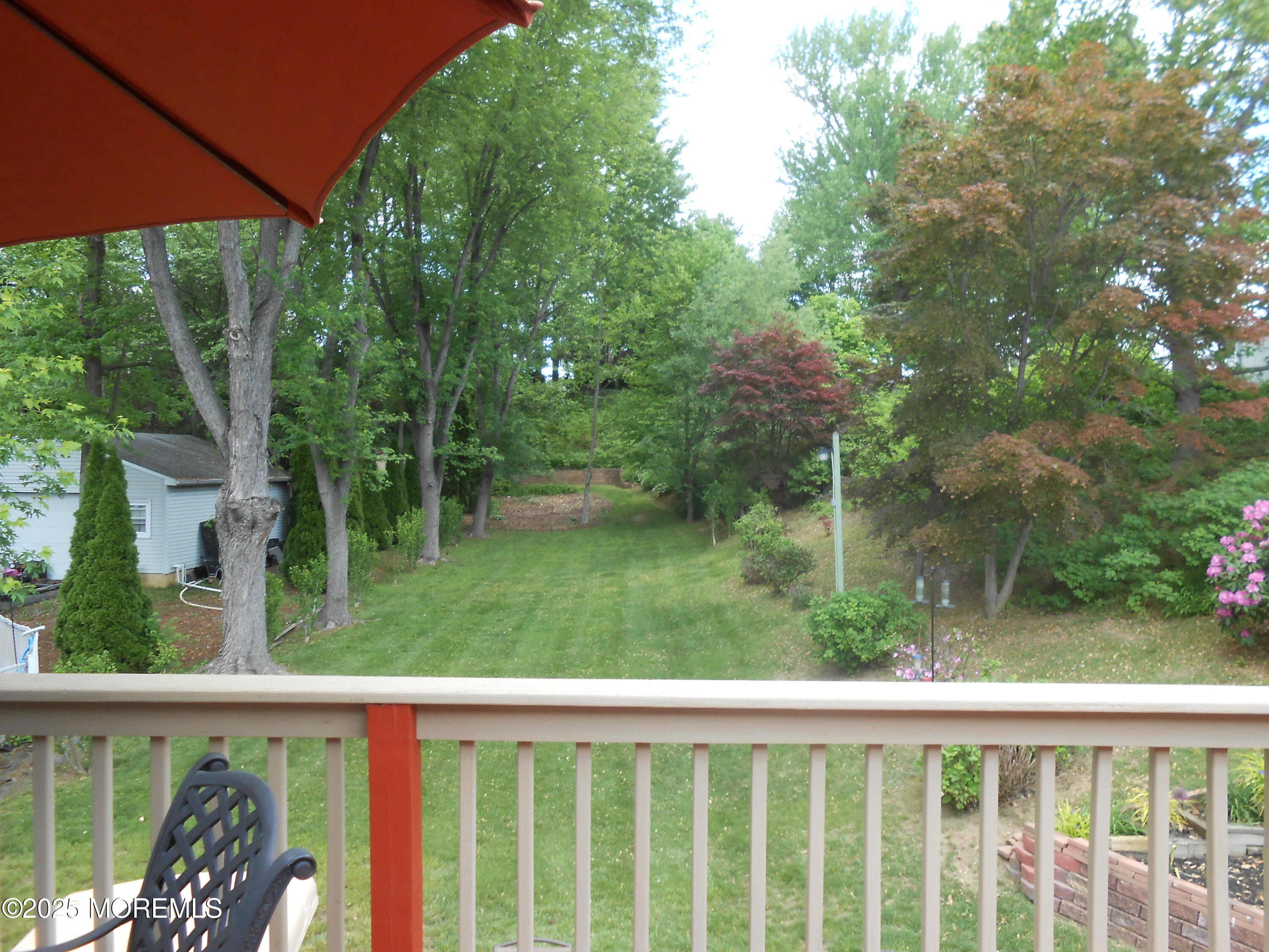 603 Bloomfield Drive Westampton, NJ 08060 - Photo 21 of 66 a view of a yard from a balcony