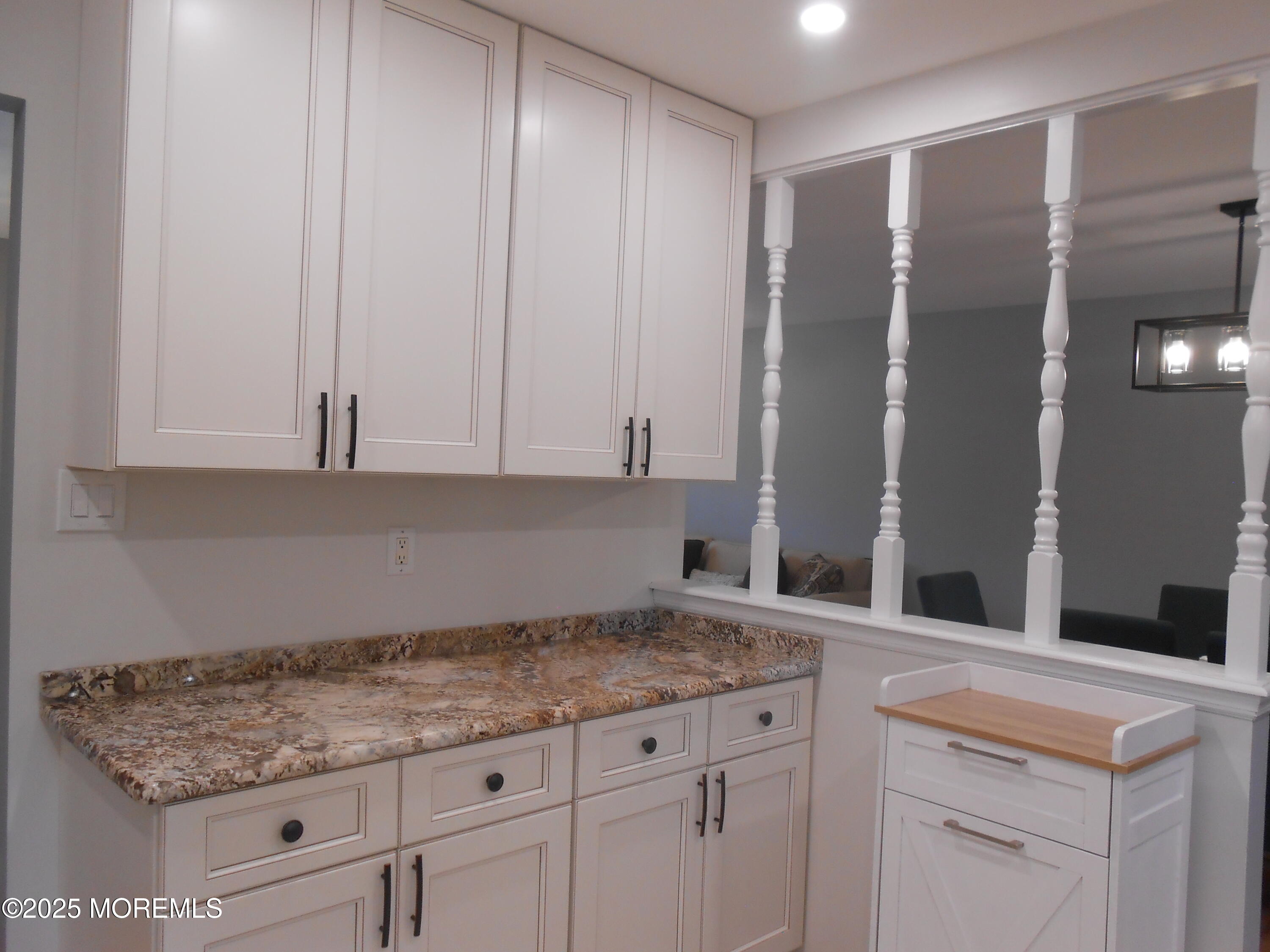 603 Bloomfield Drive Westampton, NJ 08060 - Photo 35 of 66 a kitchen with granite countertop a sink and cabinets