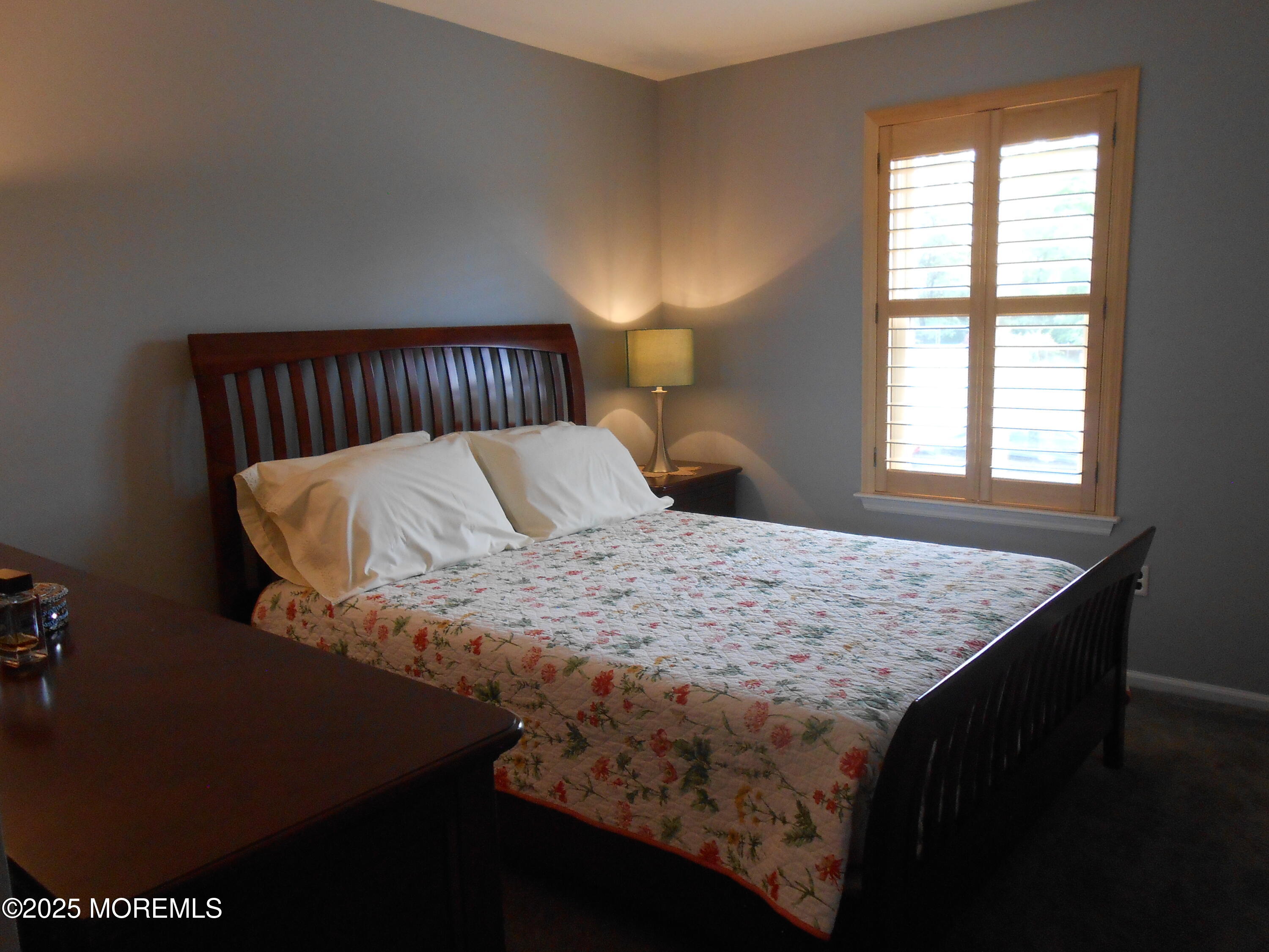603 Bloomfield Drive Westampton, NJ 08060 - Photo 44 of 66 a bed sitting in a bedroom next to a window