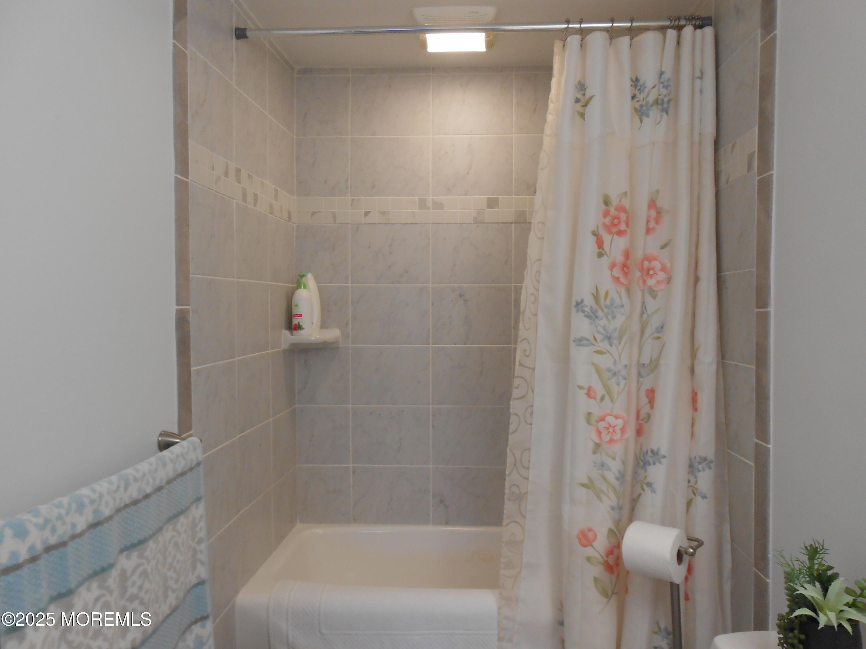 603 Bloomfield Drive Westampton, NJ 08060 - Photo 53 of 66 a bathroom with a shower curtain