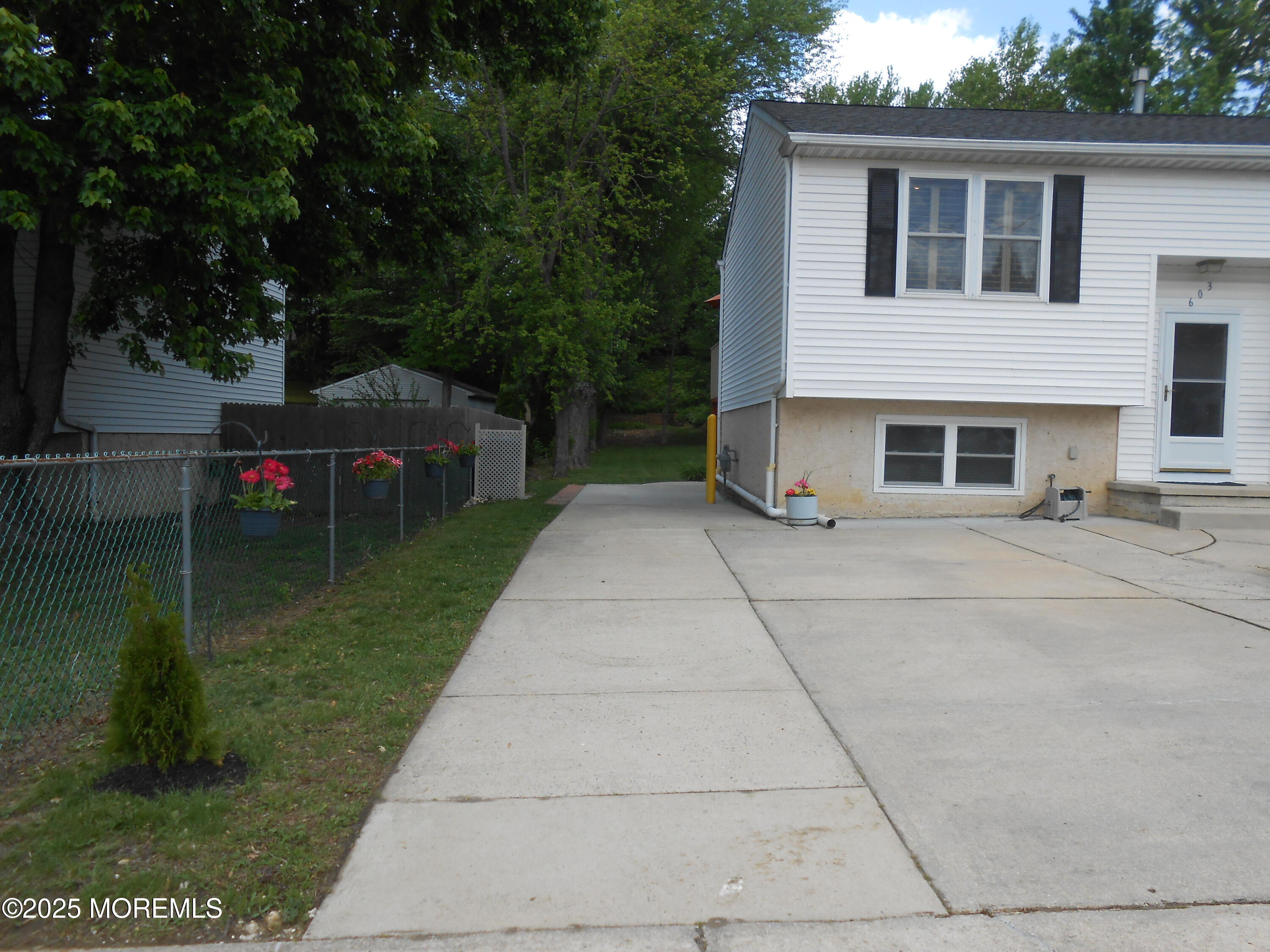 603 Bloomfield Drive Westampton, NJ 08060 - Photo 6 of 66 a view of house with garden and a patio