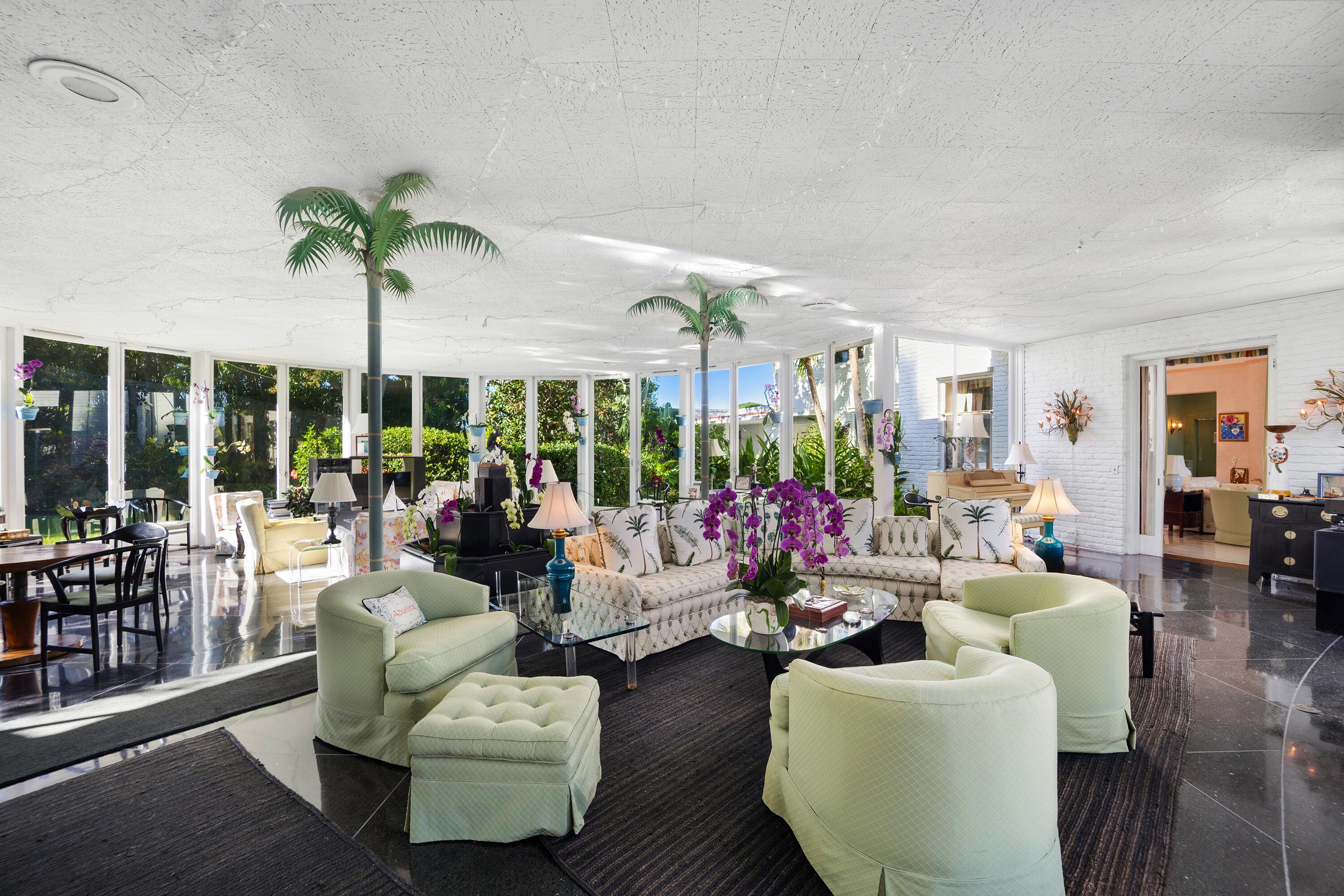 350 Island Road Palm Beach, FL 33480 - Photo 14 of 26 a living room with furniture and a large window