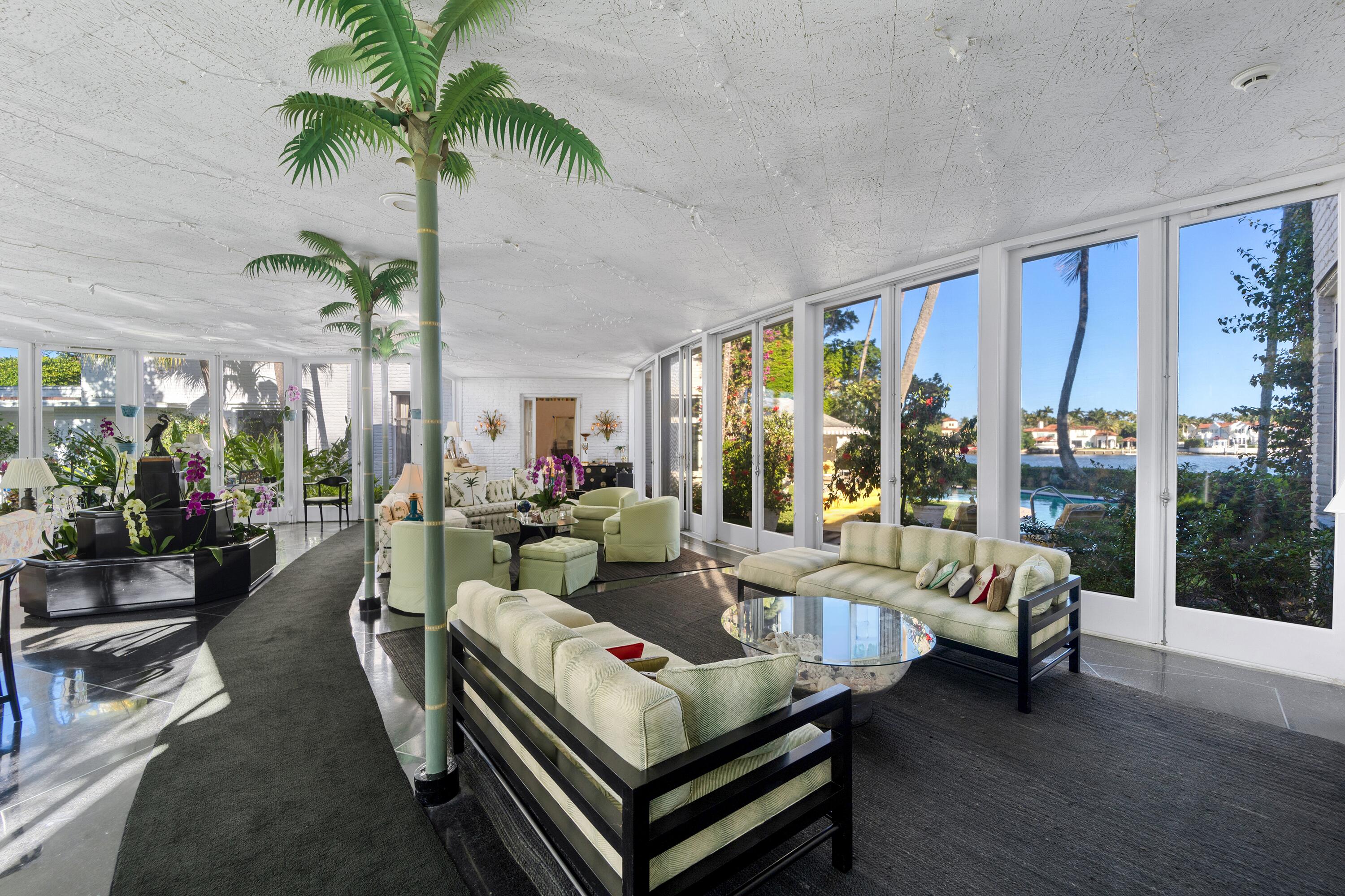 350 Island Road Palm Beach, FL 33480 - Photo 16 of 26 a living room with furniture and a large window
