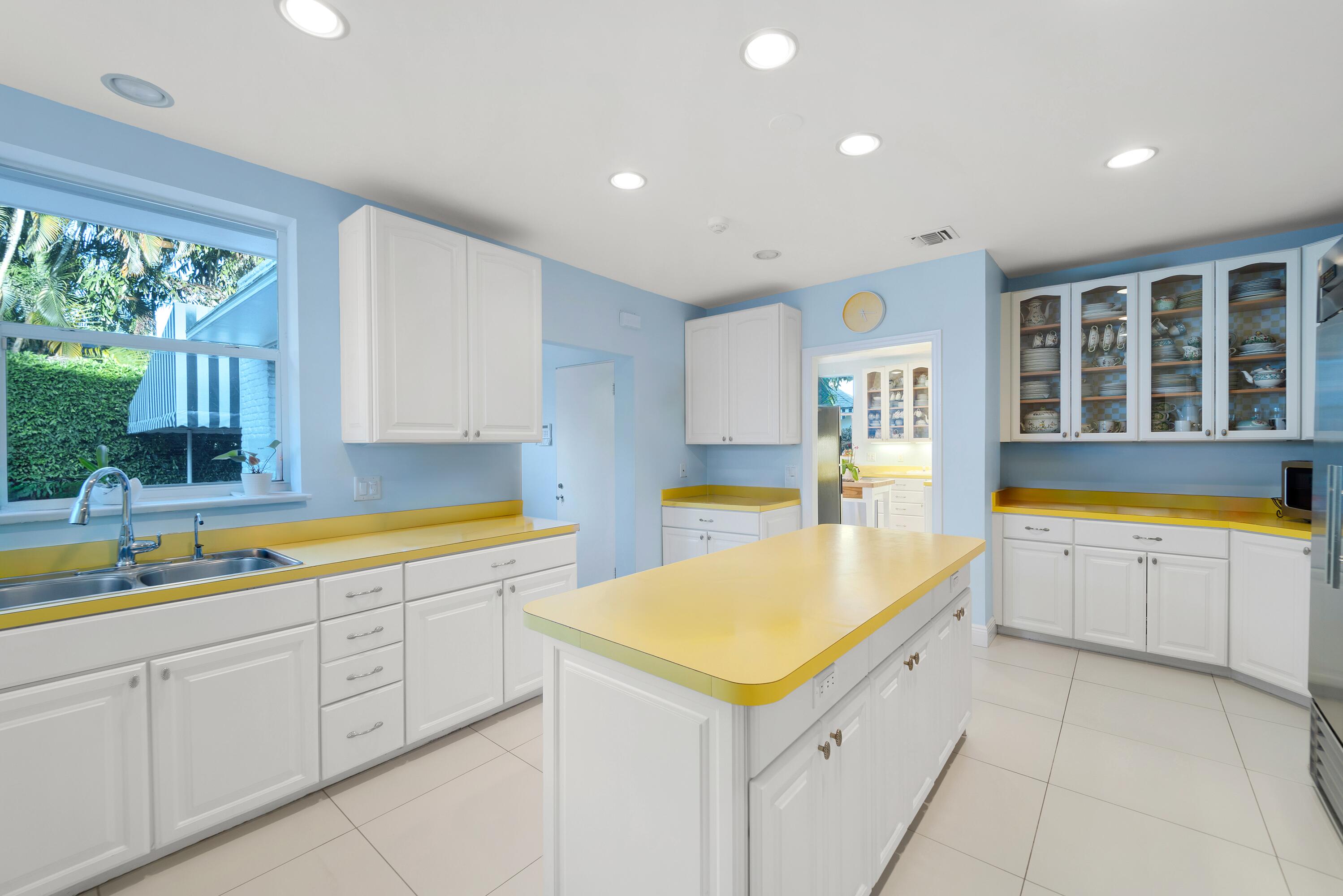 350 Island Road Palm Beach, FL 33480 - Photo 17 of 26 a large kitchen with a sink and cabinets