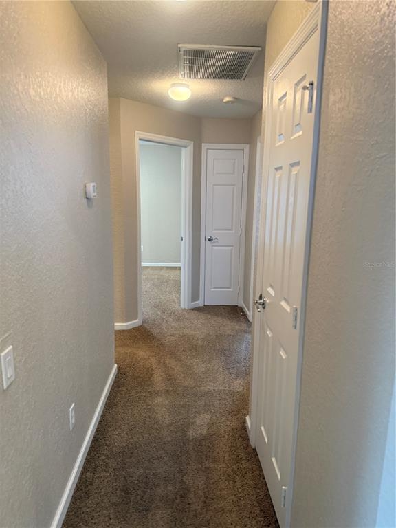 1100 Brant Point Orlando, FL 32828 - Photo 14 of 26 a view of a hallway
