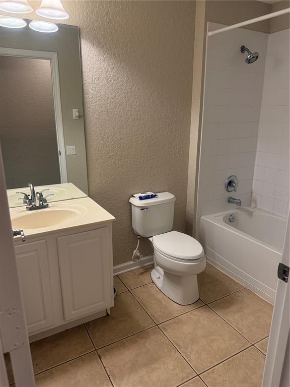 1100 Brant Point Orlando, FL 32828 - Photo 17 of 26 a bathroom with a sink a toilet and shower