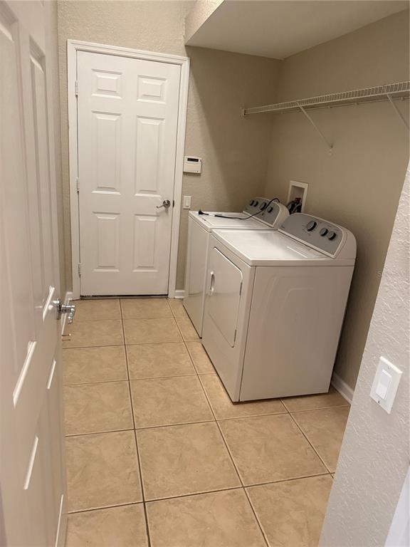 1100 Brant Point Orlando, FL 32828 - Photo 20 of 26 a utility room with a washer and dryer