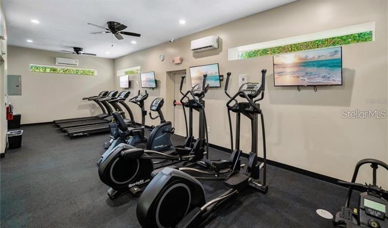 1100 Brant Point Orlando, FL 32828 - Photo 24 of 26 a view of a room with gym equipment