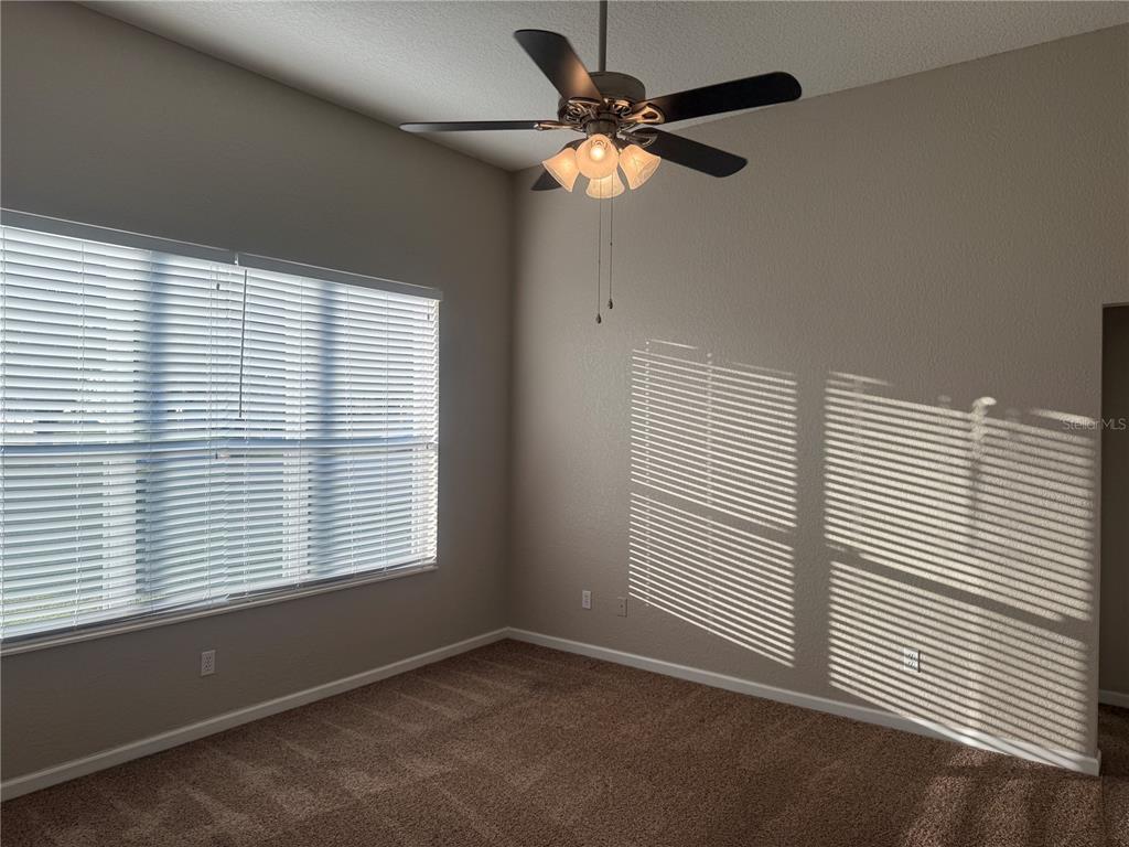 1100 Brant Point Orlando, FL 32828 - Photo 7 of 26 an empty room with a window