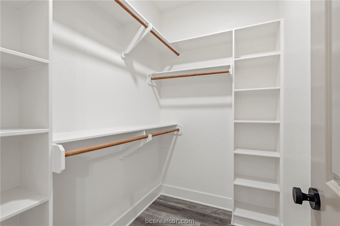 205 Lock Lane Bryan, TX 77803 - Photo 21 of 23 a view of an empty walk in closet