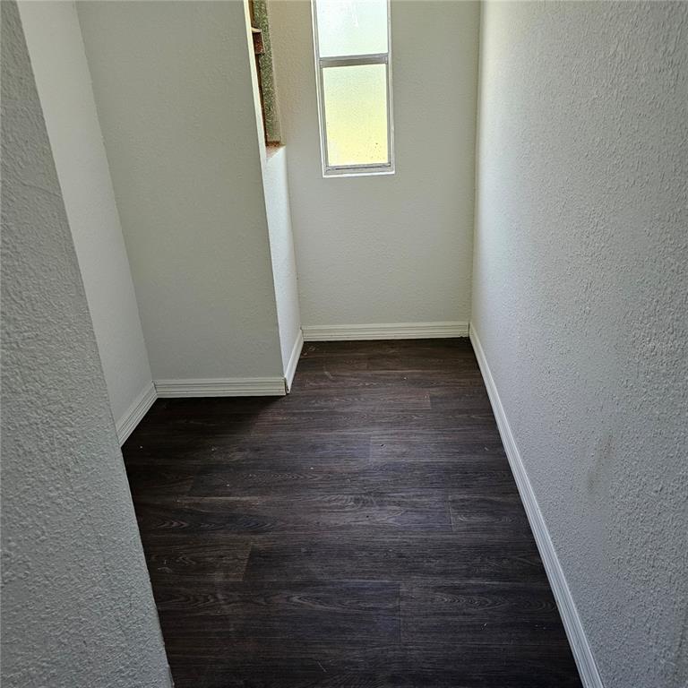 2603 Ince Drive Ruskin, FL 33570 - Photo 4 of 10 a view of a hallway with wooden floor