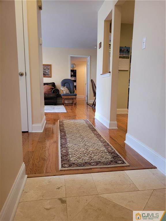 2705 Ridgefield Court, Unit 2705 Helmetta, NJ 08828 - Photo 2 of 33 a living room with furniture