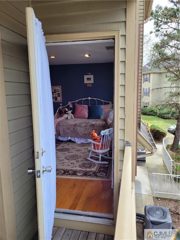2705 Ridgefield Court, Unit 2705 Helmetta, NJ 08828 - Photo 23 of 33 a view of living room filled with furniture and a rug