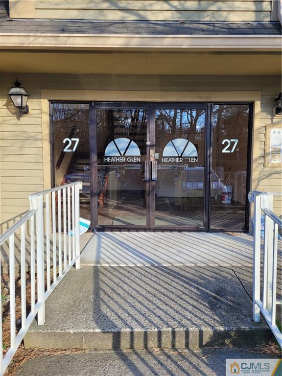 2705 Ridgefield Court, Unit 2705 Helmetta, NJ 08828 - Photo 32 of 33 a view of a door and a window
