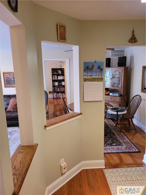 2705 Ridgefield Court, Unit 2705 Helmetta, NJ 08828 - Photo 7 of 33 a living room with furniture and a rug