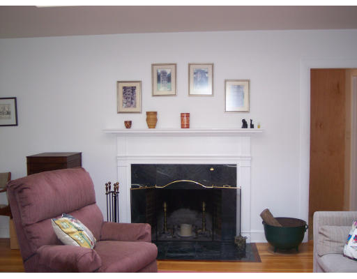 72 Fox Run Road Hamilton, MA 01982 - Photo 5 of 8 a living room with furniture and a fireplace