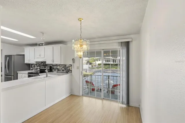 a view of a room with windows