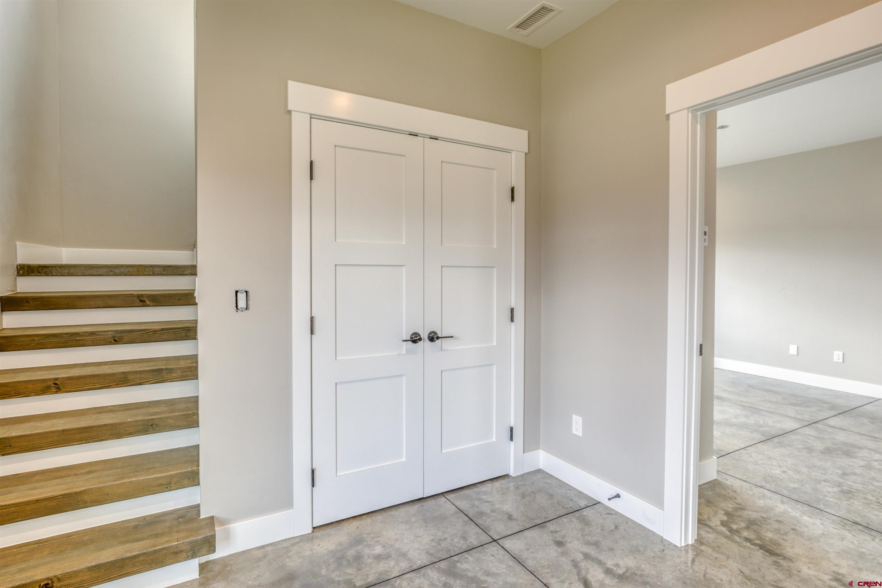 2790 Rock Road, Unit F Pagosa Springs, CO 81147 - Photo 22 of 45 a view of a livingroom from a hallway