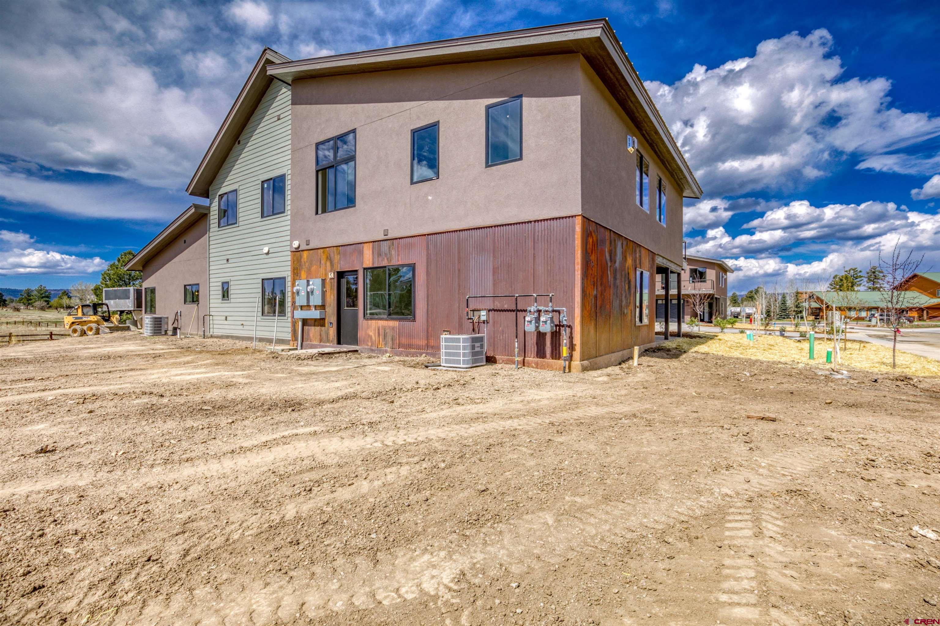 2790 Rock Road, Unit F Pagosa Springs, CO 81147 - Photo 3 of 45 a view of street with large building