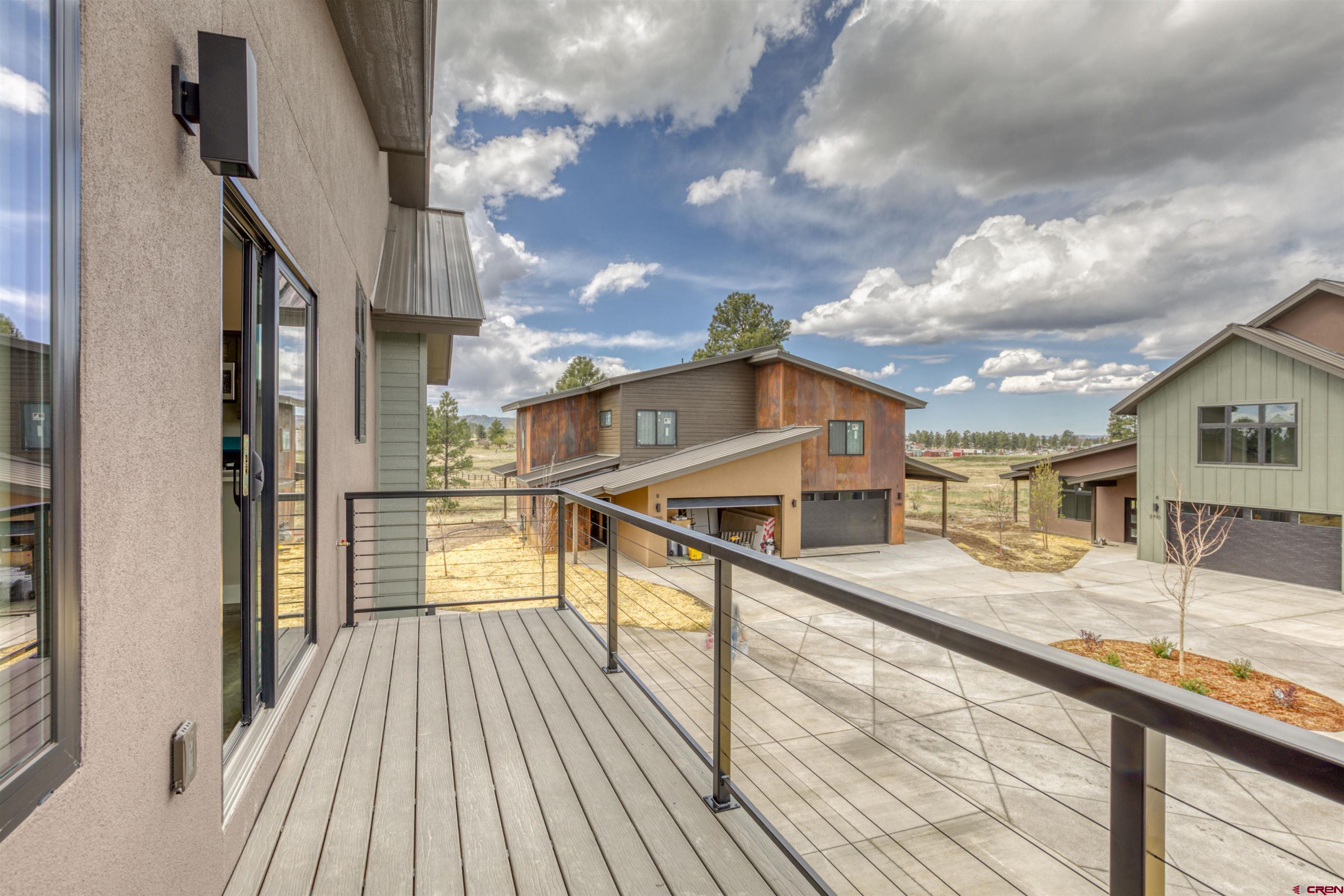 2790 Rock Road, Unit F Pagosa Springs, CO 81147 - Photo 36 of 45 a view of a house with pool and wooden floor
