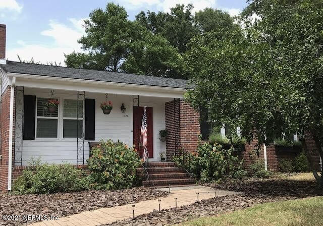 1677 Geraldine Drive Jacksonville, FL 32205 - Photo 1 of 52 a front view of a house with garden