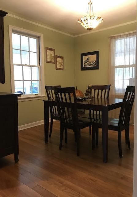1677 Geraldine Drive Jacksonville, FL 32205 - Photo 13 of 52 a view of a dining room with furniture window and wooden floor