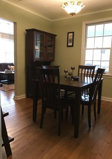 1677 Geraldine Drive Jacksonville, FL 32205 - Photo 14 of 52 a view of a dining room with furniture and wooden floor